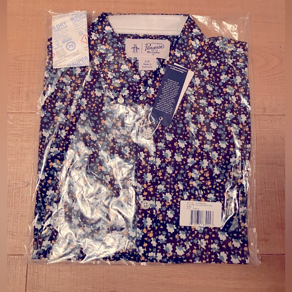 Penguin menswear button up short sleeve shirt. Floral pattern